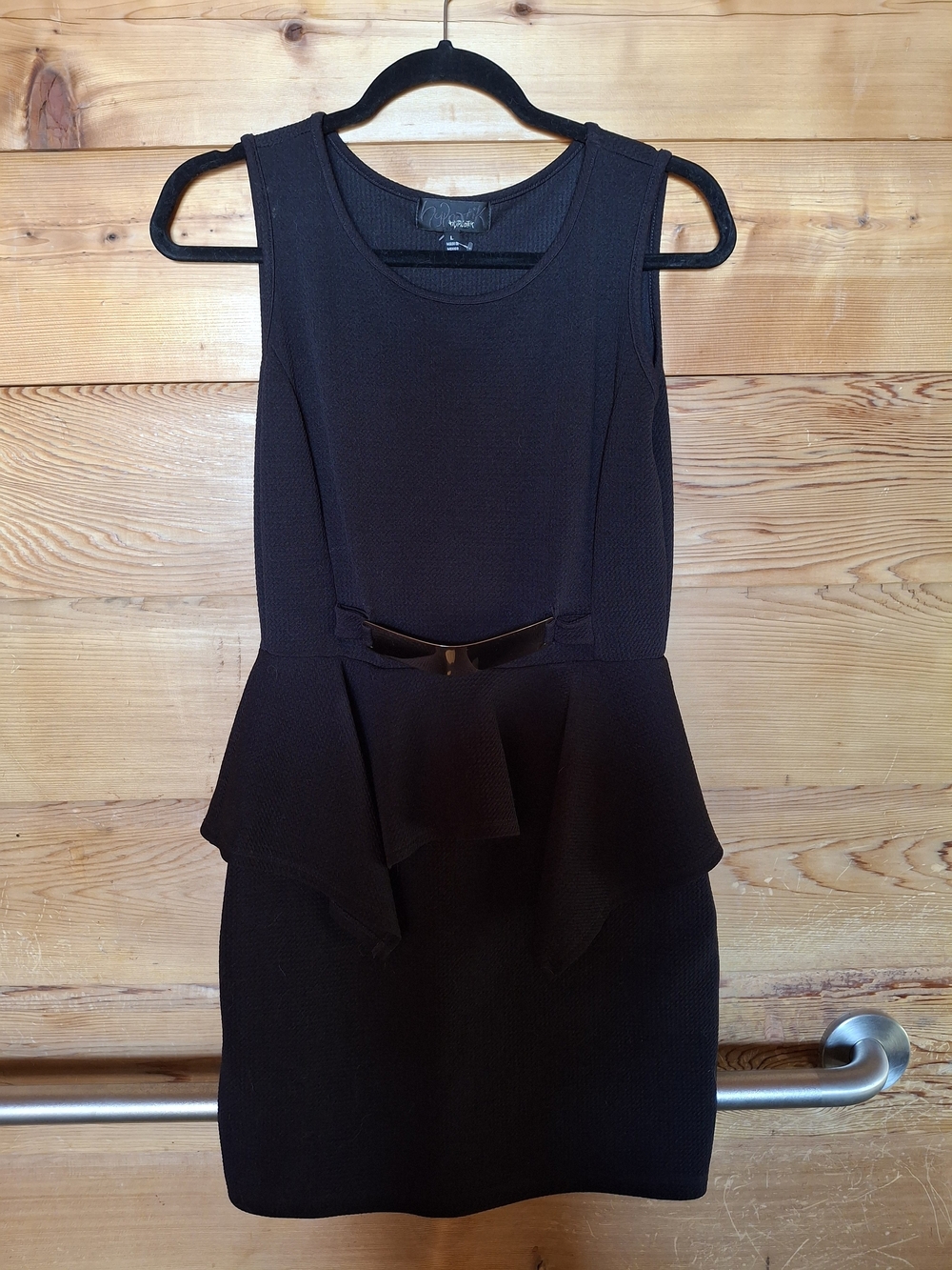 Sleeveless Black Peplum Midi Dress with Waist Accent